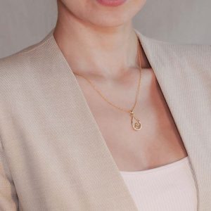 14k-yellow-gold-trinity-knot-diamond-set-pendant-14P688-on-model